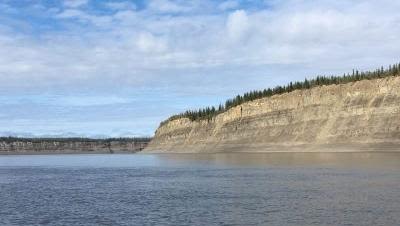 Sedimentary rocks on the banks of the Mackenzie River, Canada, a major river basin where rock weathering is a CO2 source.