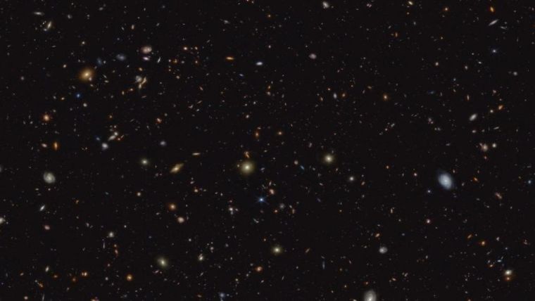 An infrared image taken as part of the JADES programme (the JWST Advanced Deep Extragalactic Survey), showing a portion of an area of the sky known as GOODS-South where the observation in the study was made.