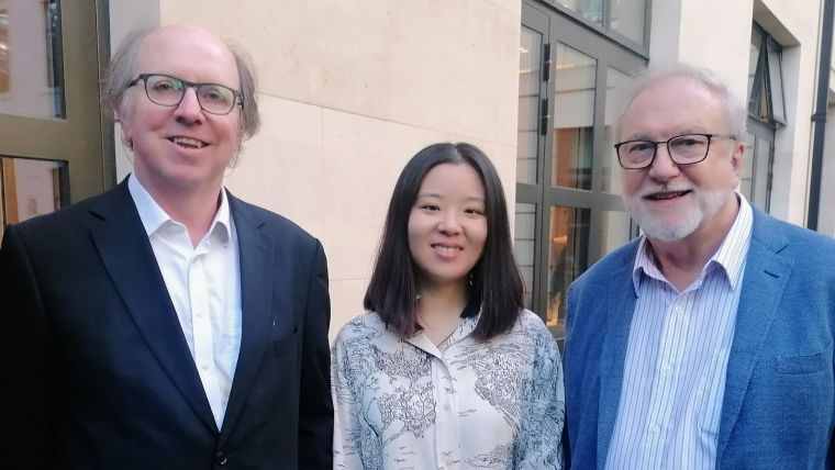 Professor Sam Howison pictured (left) with Professor Yujia Qing and Professor Hagan Bayley