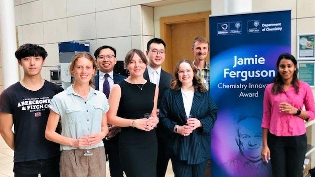 DPhil student finalists at the inaugural Jamie Ferguson Chemistry Innovation Awards 2022, pictured with a promotional banner for the awards