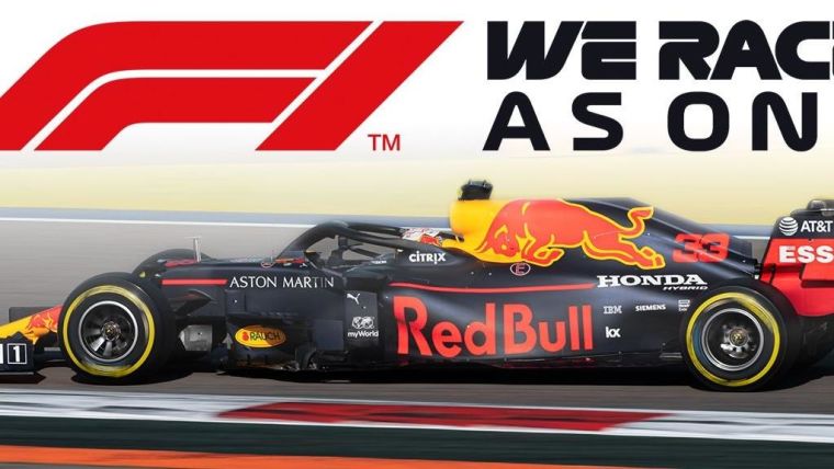 A Formula 1 car with the slogan 'F1 - We race as one'