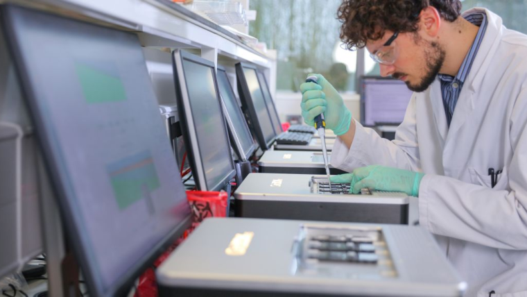 A scientist working on Oxford Nanopore's GridION technology