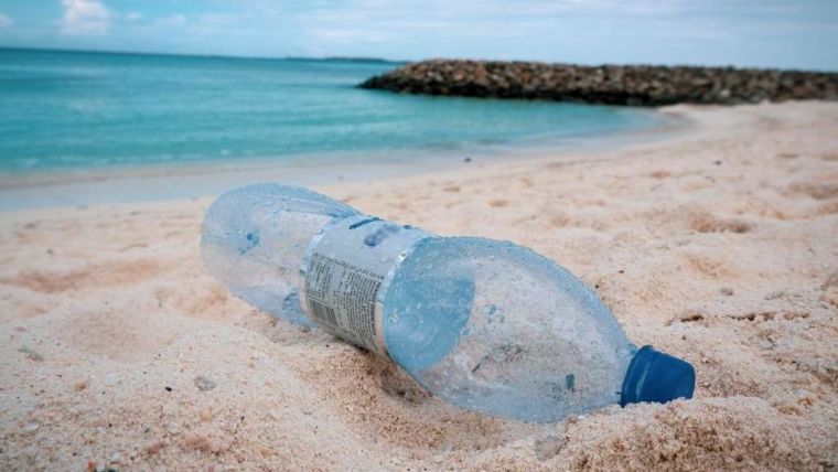 A plastic bottle on a beach in the Maldives.